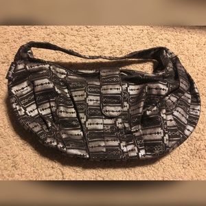 Yak Pak Razor Blade Arm Purse